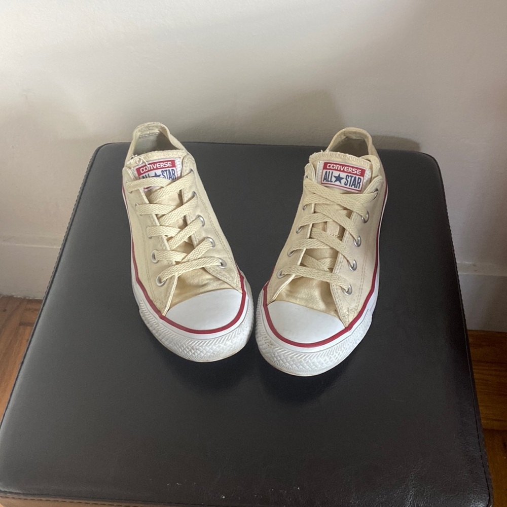 cream white colored converse